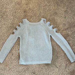 gray ripped sweater
